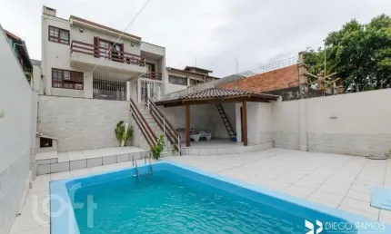 Casa com 4 quartos à venda na Rua Paul Harris, 130, Jardim Itu Sabará, Porto Alegre, 245 m2 por R$ 1.450.000