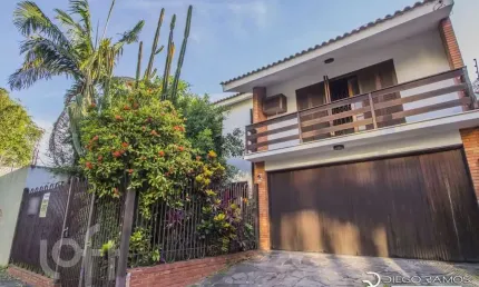 Casa com 4 quartos à venda na Avenida Panamericana, 940, Jardim Lindóia, Porto Alegre, 303 m2 por R$ 1.850.000