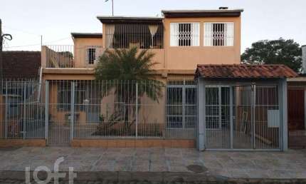 Casa com 4 quartos à venda na Acesso A Três, 4258, Restinga, Porto Alegre, 250 m2 por R$ 280.000