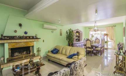 Casa com 4 quartos à venda na Rua Menezes Paredes, 208, Nonoai, Porto Alegre, 262 m2 por R$ 1.330.000