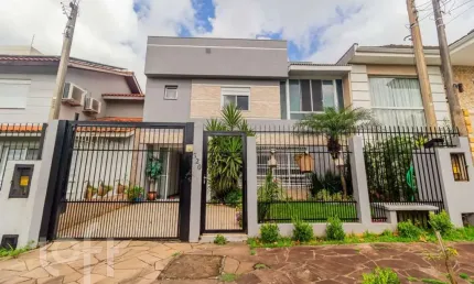 Casa em condomínio fechado com 3 quartos à venda na Rua Ronaldo Molina de Quadros, 320, Mário Quintana, Porto Alegre, 200 m2 por R$ 1.000.000