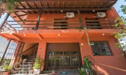 Casa com 4 quartos à venda na Avenida dos Prazeres, 886, Vila Jardim, Porto Alegre, 528 m2 por R$ 1.491.500