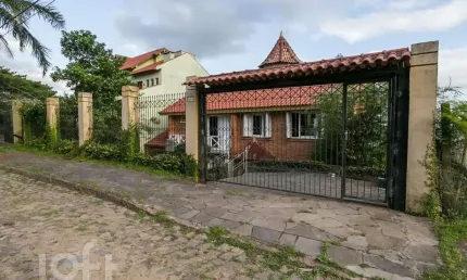 Casa com 3 quartos à venda na rua fernando osório, 1869, teresópolis, porto alegre, 256 m2 por r$ 785.000