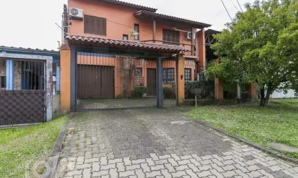 Casa com 3 quartos à venda na Rua Tomé Antônio de Souza, 267, Campo Novo, Porto Alegre, 150 m2 por R$ 497.000