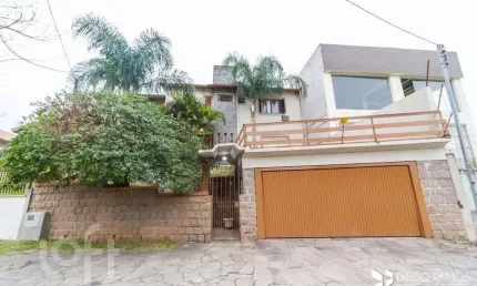 Casa com 4 quartos à venda na Avenida da Serraria, 742, Espírito Santo, Porto Alegre, 284 m2 por R$ 900.000