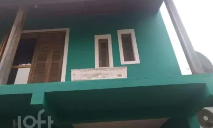 Casa com 3 quartos à venda na Rua Nei Remedi, 44, Hípica, Porto Alegre, 127 m2 por R$ 422.750
