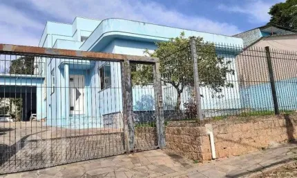 Casa com 5 quartos à venda na Rua Leão Licurgo Brasiliano Arano, 125, Vila Nova, Porto Alegre, 312 m2 por R$ 850.000