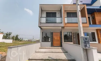 Casa em condomínio fechado com 2 quartos à venda na Avenida Edgar Pires de Castro, 34, Hípica, Porto Alegre, 108 m2 por R$ 410.000