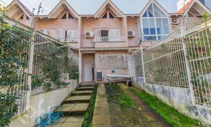 Casa com 2 quartos à venda na Rua Heitor Kramer, 324, Hípica, Porto Alegre, 120 m2 por R$ 450.000
