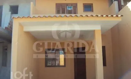 Casa com 3 quartos à venda na Rua Alexio Fagherazzi, 67, Hípica, Porto Alegre, 115 m2 por R$ 395.000