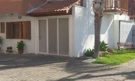 Casa com 3 quartos à venda na Rua Landel de Moura, 2225, Camaquã, Porto Alegre, 131 m2 por R$ 559.000