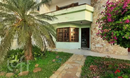 Casa com 3 quartos à venda na Rua Orfanotrófio, 1190, Nonoai, Porto Alegre, 182 m2 por R$ 902.500