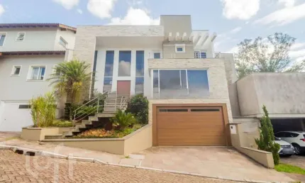 Casa em condomínio fechado com 3 quartos à venda na Rua Tocantins, 540, Agronomia, Porto Alegre, 396 m2 por R$ 1.300.000
