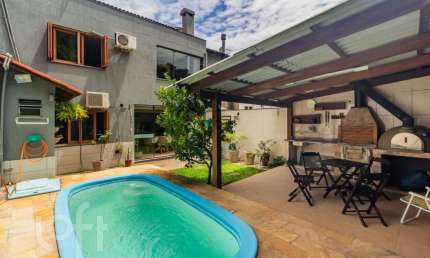 Casa em condomínio fechado com 4 quartos à venda na Rua Adriano Pereira da Silva, 311, Vila Nova, Porto Alegre, 243 m2 por R$ 1.235.000