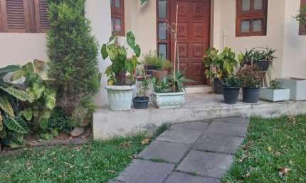 Casa com 2 quartos à venda na Rua Germano Petersen Júnior, 458, Auxiliadora, Porto Alegre, 120 m2 por R$ 1.500.000