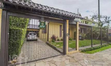 Casa com 3 quartos à venda na Rua Professor Guerreiro Lima, 585, Partenon, Porto Alegre, 240 m2 por R$ 1.200.000