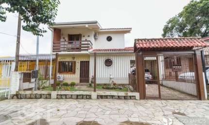 Casa com 4 quartos à venda na Rua Doutor Hermes Pacheco, 465, Hípica, Porto Alegre, 207 m2 por R$ 680.000