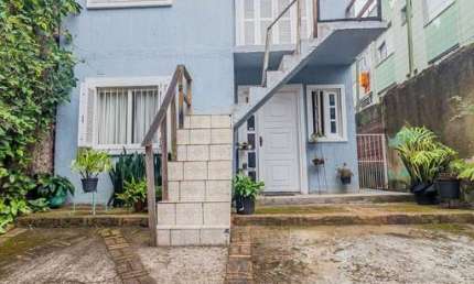 Casa com 3 quartos à venda na Rua Barão de Tramandaí, 254, Passo da Areia, Porto Alegre, 200 m2 por R$ 550.000