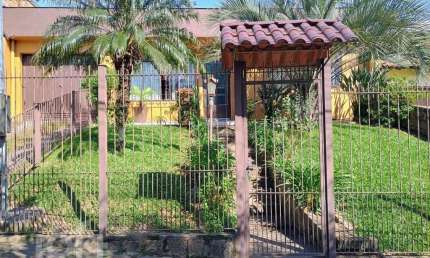 Casa com 3 quartos à venda na Rua Marquês do Maricá, 135, Vila Nova, Porto Alegre, 127 m2 por R$ 712.500