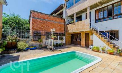 Casa com 3 quartos à venda na Rua Vinte e Seis de Dezembro, 648, São José, Porto Alegre, 186 m2 por R$ 520.000