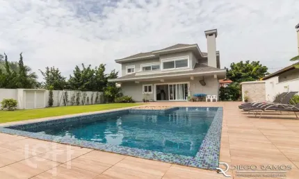 Casa em condomínio fechado com 5 quartos à venda na Avenida Juca Batista, 8000, Belém Novo, Porto Alegre, 413 m2 por R$ 3.600.000