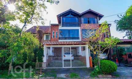 Casa com 3 quartos à venda na Rua Ponciano Pacheco da Silveira, 114, Guarujá, Porto Alegre, 181 m2 por R$ 568.000