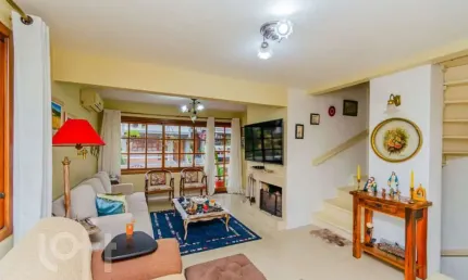 Casa em condomínio fechado com 3 quartos à venda na Rua General Rondon, 1259, Tristeza, Porto Alegre, 185 m2 por R$ 845.500