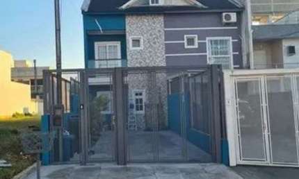 Casa com 4 quartos à venda na Rua Silvino Nedel, 100, Mário Quintana, Porto Alegre, 129 m2 por R$ 680.000