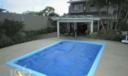 Casa com 3 quartos à venda na Rua Guarajá, 95, Jardim Botânico, Porto Alegre, 245 m2 por R$ 1.750.000