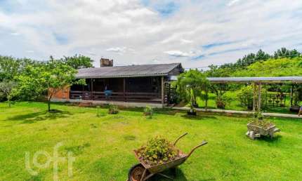 Casa em condomínio fechado com 3 quartos à venda na Estrada Otaviano José Pinto, 5599, Lami, Porto Alegre, 154 m2 por R$ 508.800
