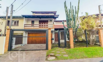 Casa com 3 quartos à venda na Rua Henrique Scliar, 284, Jardim Itu Sabará, Porto Alegre, 380 m2 por R$ 1.950.000