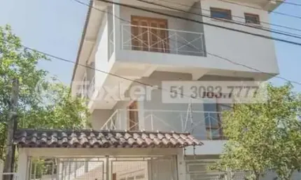 Casa em condomínio fechado com 3 quartos à venda na Rua Jamil Antônio José, 46, Nonoai, Porto Alegre, 145 m2 por R$ 713.000