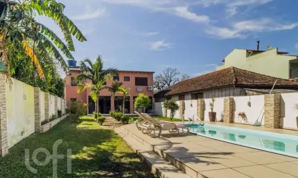 Casa com 3 quartos à venda na Rua Humberto de Campos, 1267, Partenon, Porto Alegre, 218 m2 por R$ 1.140.000