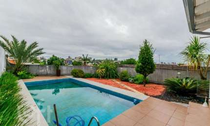 Casa com 3 quartos à venda na Rua Monte Alverne, 547, Chácara das Pedras, Porto Alegre, 273 m2 por R$ 1.400.000
