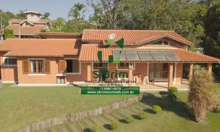 chácara em condomínio fechado - 4 dormitórios - R$1.750.000