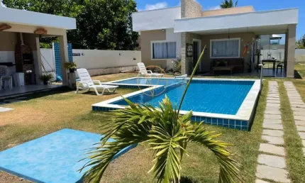 Casa com 3 dormitórios à venda, 230 m² por R$ 1.250.000,00 - Barra do Jacuípe - Camaçari/BA
