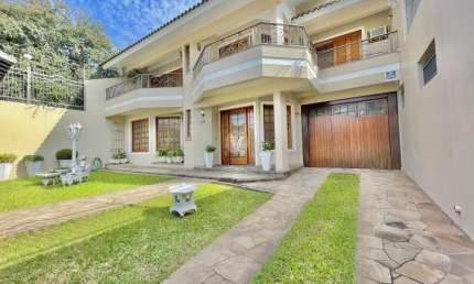 Exelente casa com 4 suítes e 661m² de área privativa!