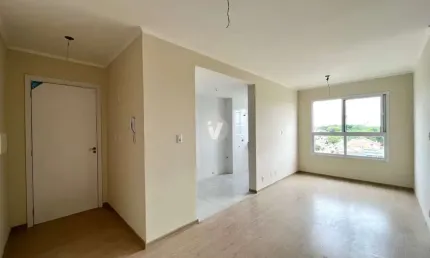 Apartamento de 2 dormitórios e com vaga de garagem.