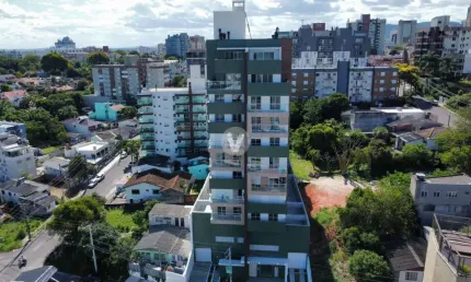 Apartamento 2 dormitórios com suíte e 2 vagas de garagem.