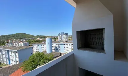 Apartamento de dois dormitórios com sacadas e vaga de garagem