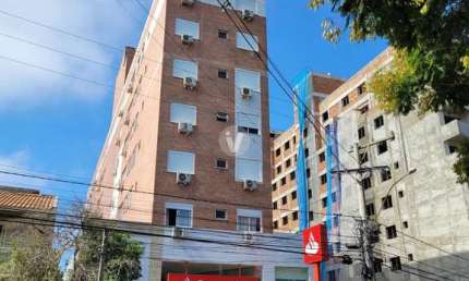 Apartamento mobiliado de 01 dormitório com churrasqueira e vaga de garagem para