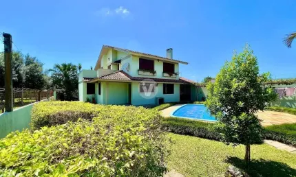 CASA NO BAIRRO CAMOBI - 5 DORMITÓRIOS E PÁTIO AMPLO