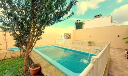 Casa Espetacular no bairro Novo Horizonte: 4 Dormitórios, Piscina e Aquecimento