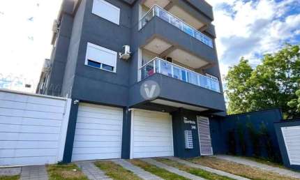 Apartamento 2 dormitórios com suíte, sacada, churrasqueira e garagem