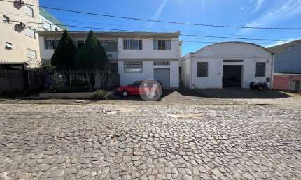 Casa comercial excelente localização com loja e pavilhão