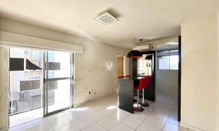 Apartamento semimobiliado  2 dormitórios e garagem em condomínio fechado!