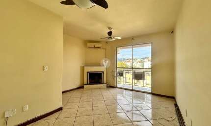 Apartamento de dois dormitórios sendo um suíte no centro de Santa Maria.