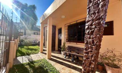 Casa 3 dormitórios, piscina e espaço gourmet no bairro N. Sra das Dores