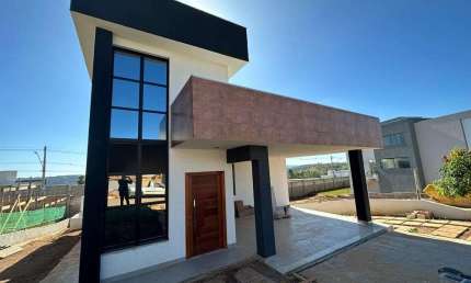 Casa com 3 dormitórios à venda, 162 m² por R$ 1.200.000,00 - Condomínio Villas Park 3 - Vespasiano/MG