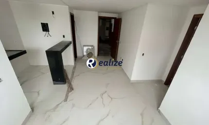 Apartamento composto por 1 quarto com Área de Lazer á venda na Praia do Morro, Guarapari-ES - Realize Negócios Imobiliários.
